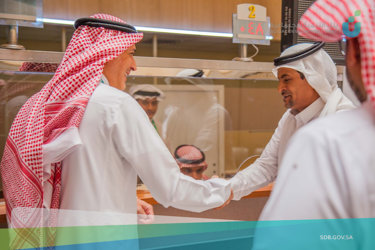 Visit by the bank manager to the Mecca branch